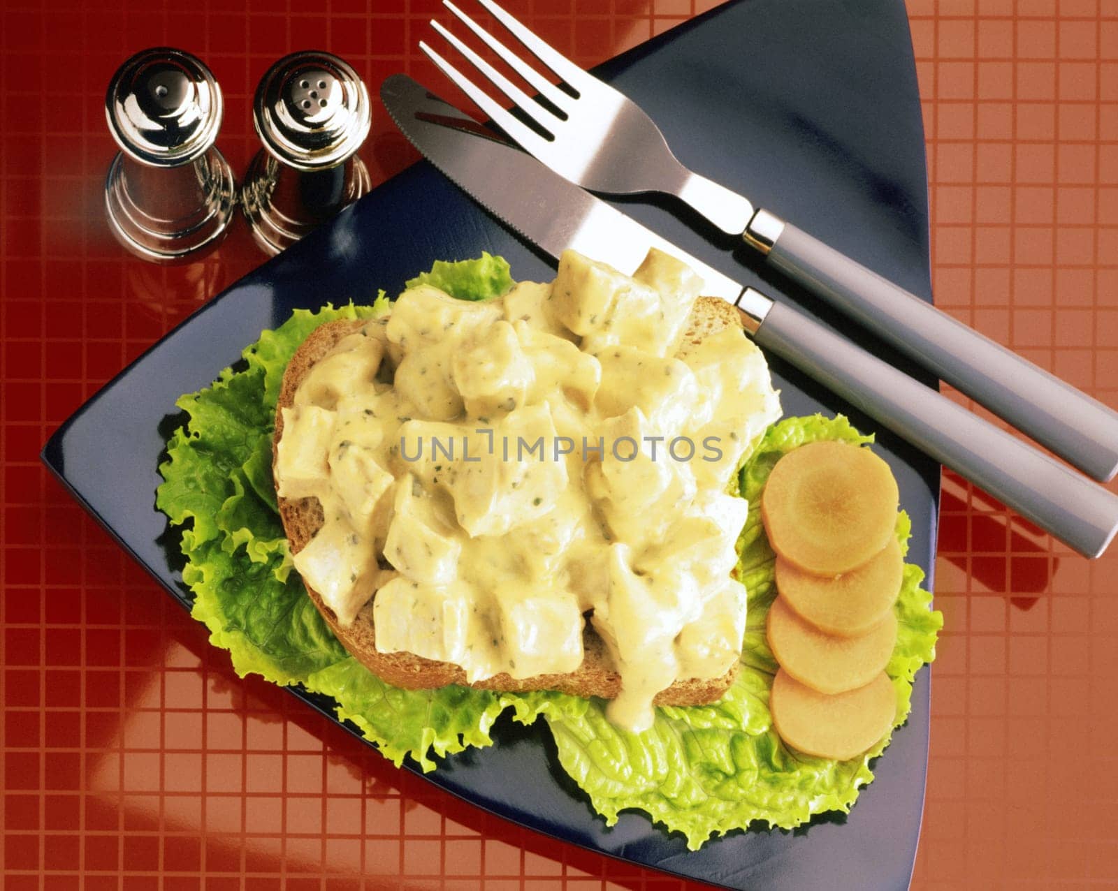 Close-up of meat covered with cheese sauce