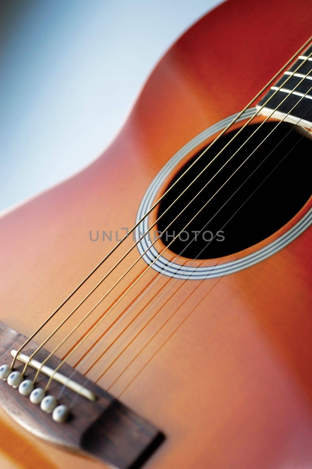 Close-up of guitar, its strings and frets