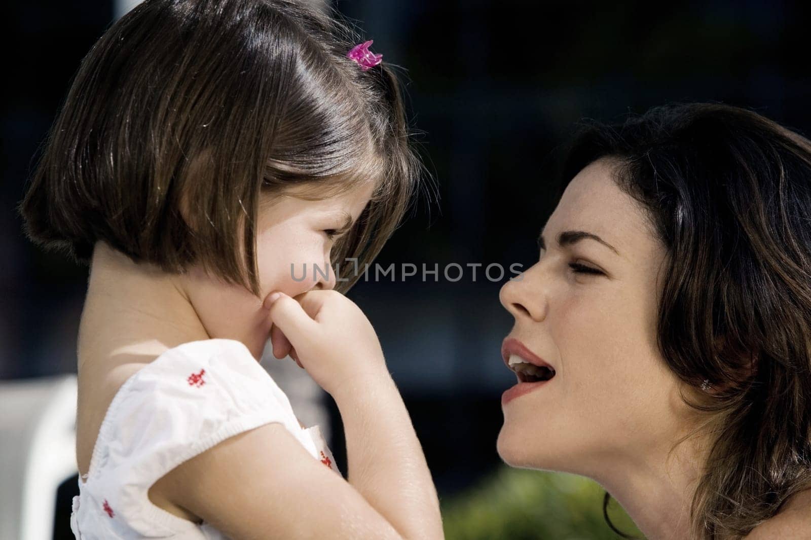 Close-up of a mother with her daughter