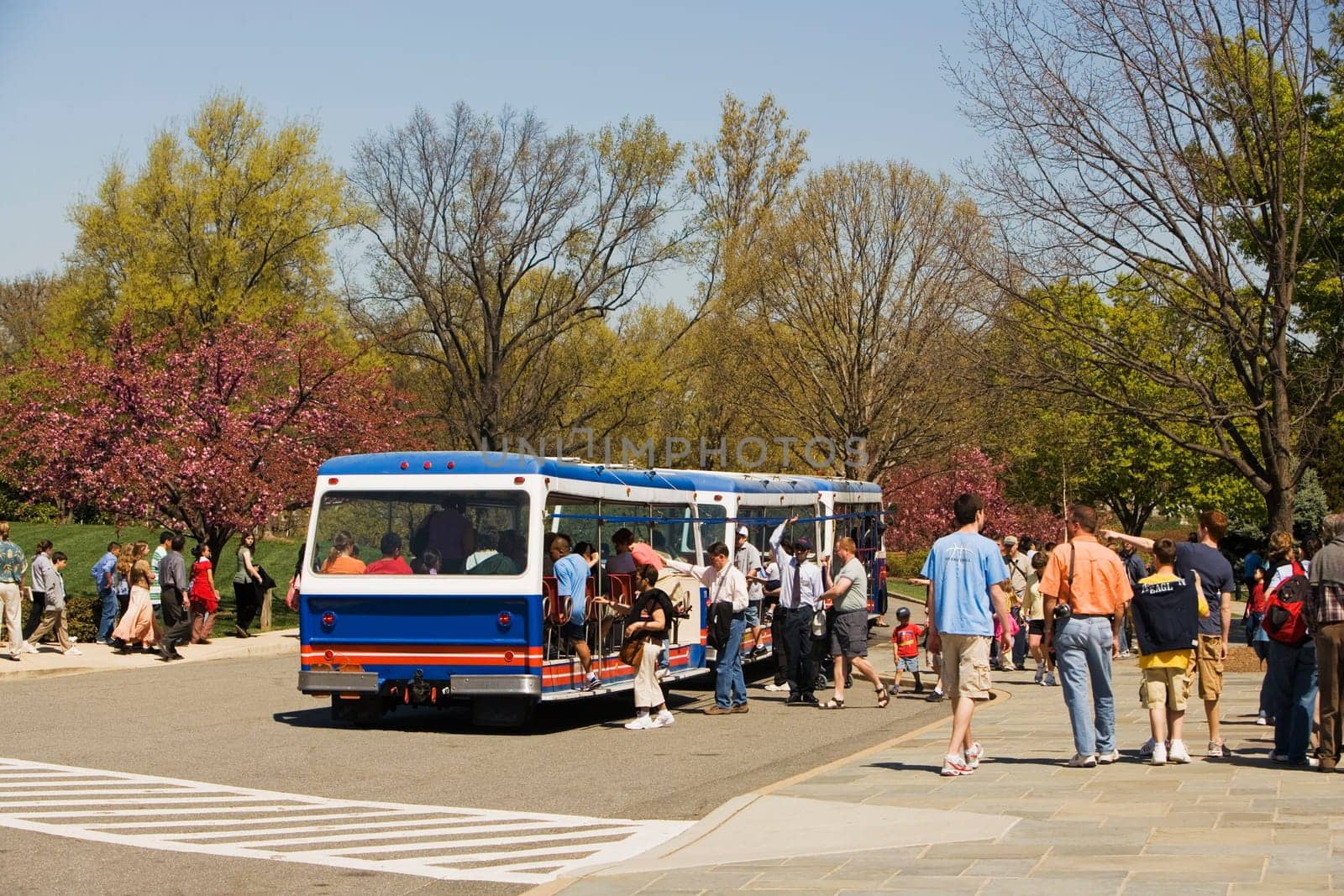 Commuters boarding a bus on the road