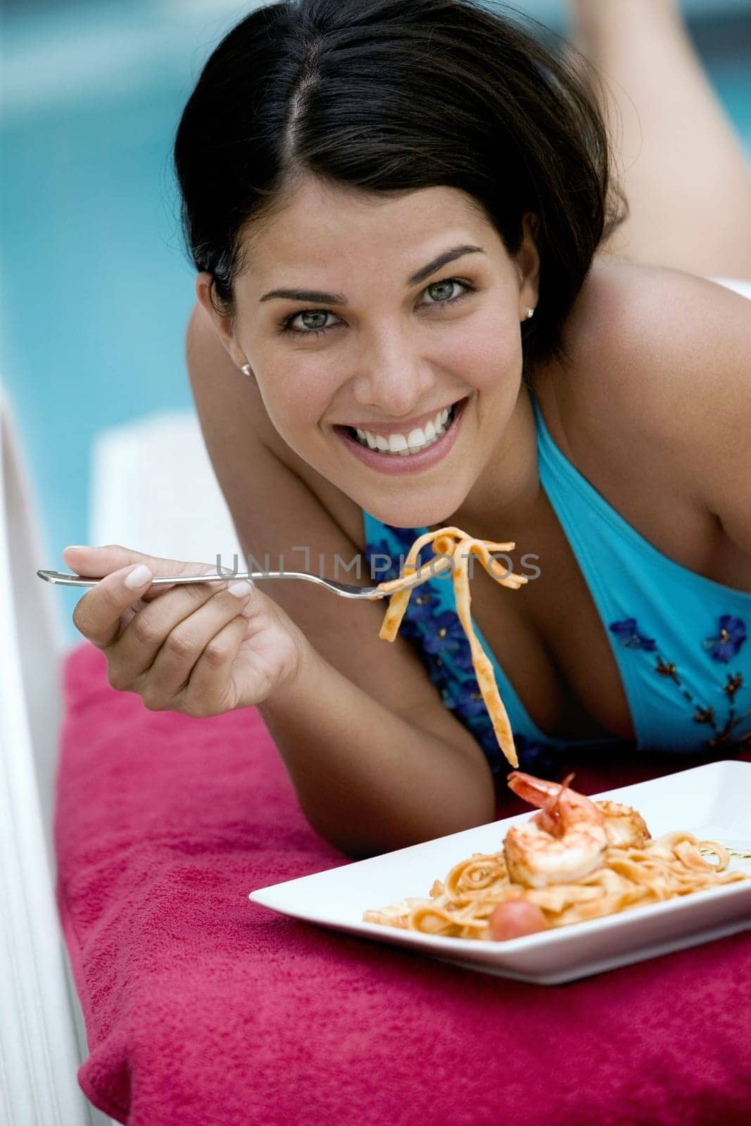 Portrait of a young woman having a meal