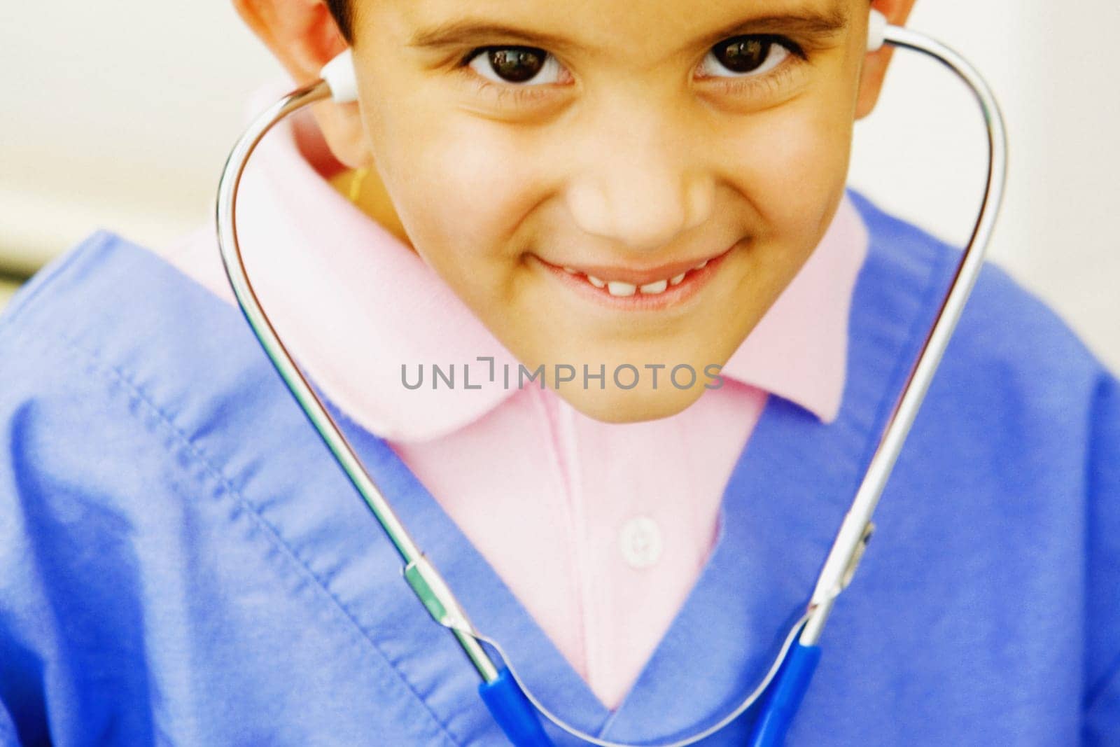 Portrait of a boy imitating a doctor