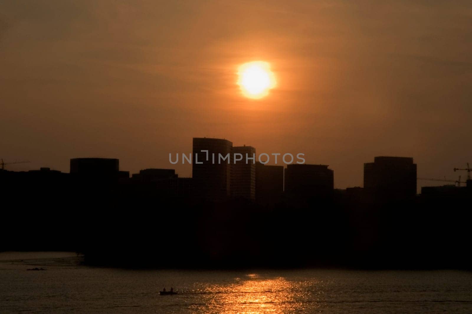 Silhouette of buildings at dusk
