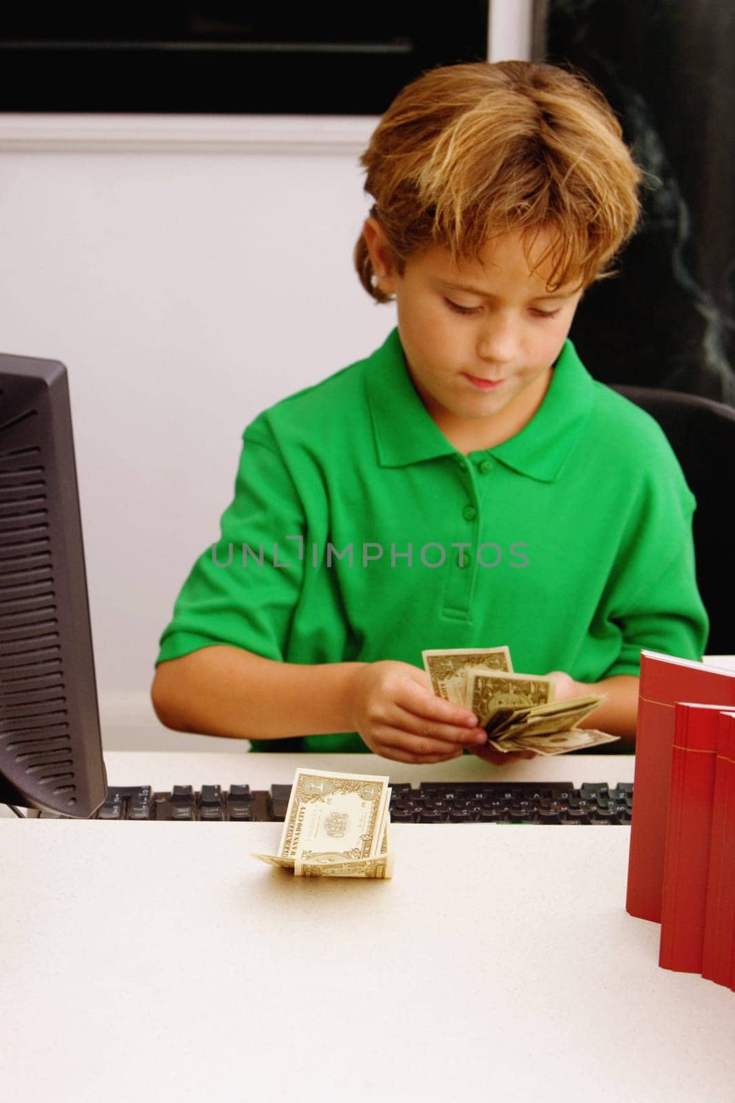 Boy counting currency notes