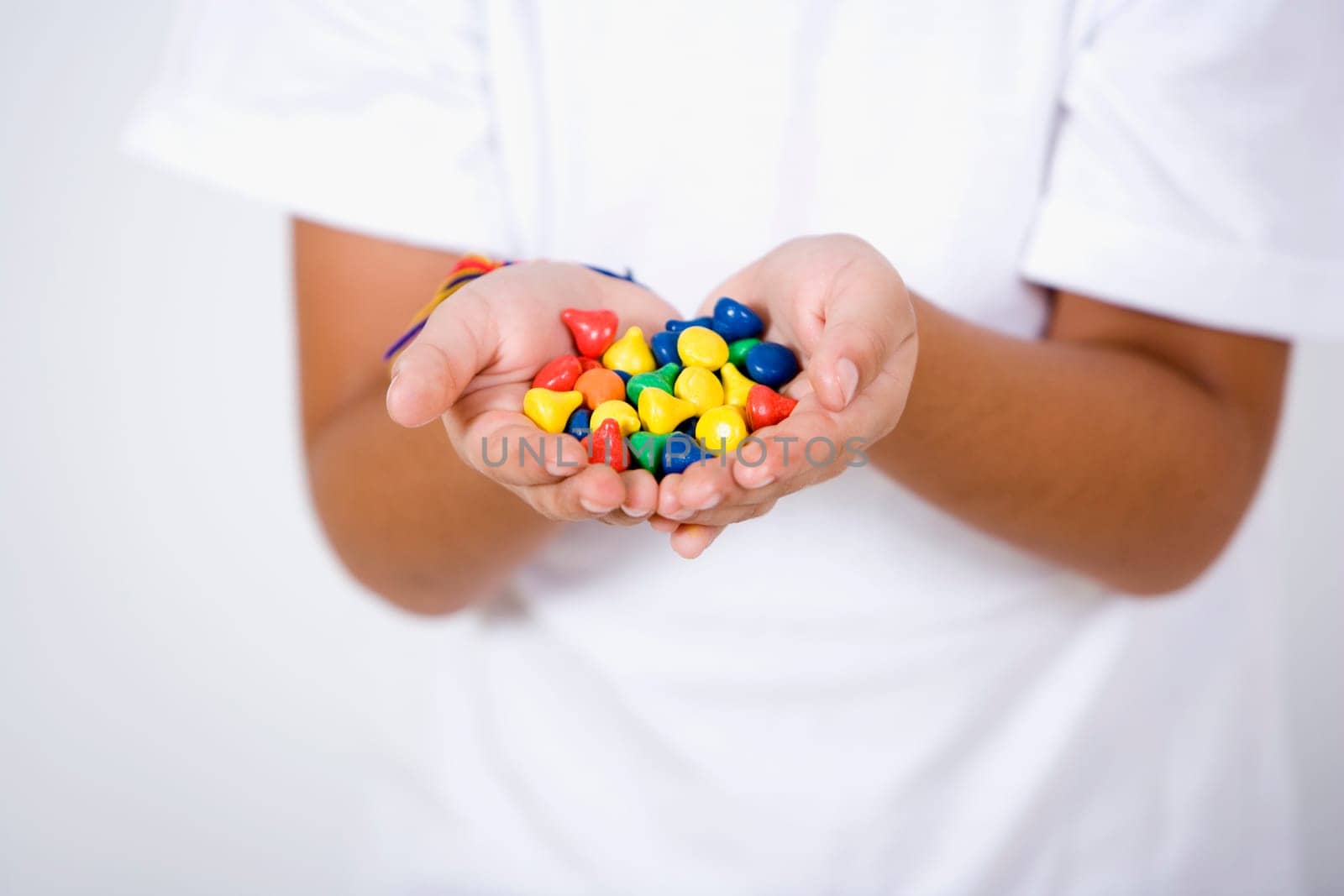 Close-up of a girlŽs hands holding candies