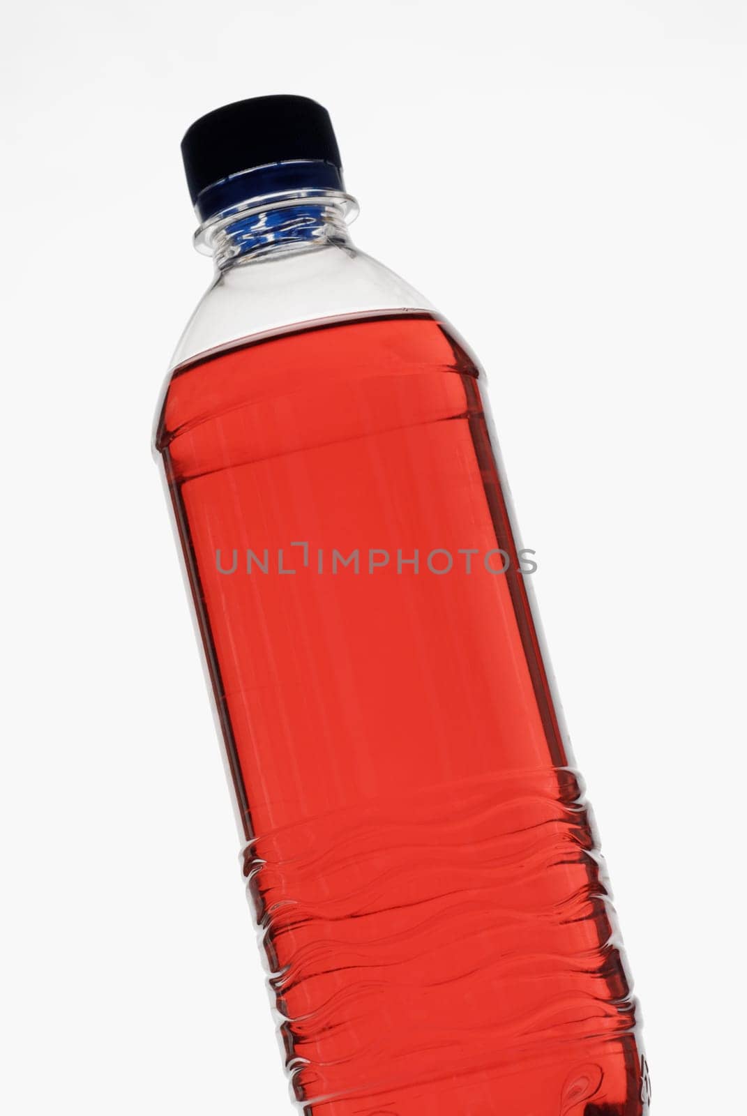 Close-up of a bottle of red liquid