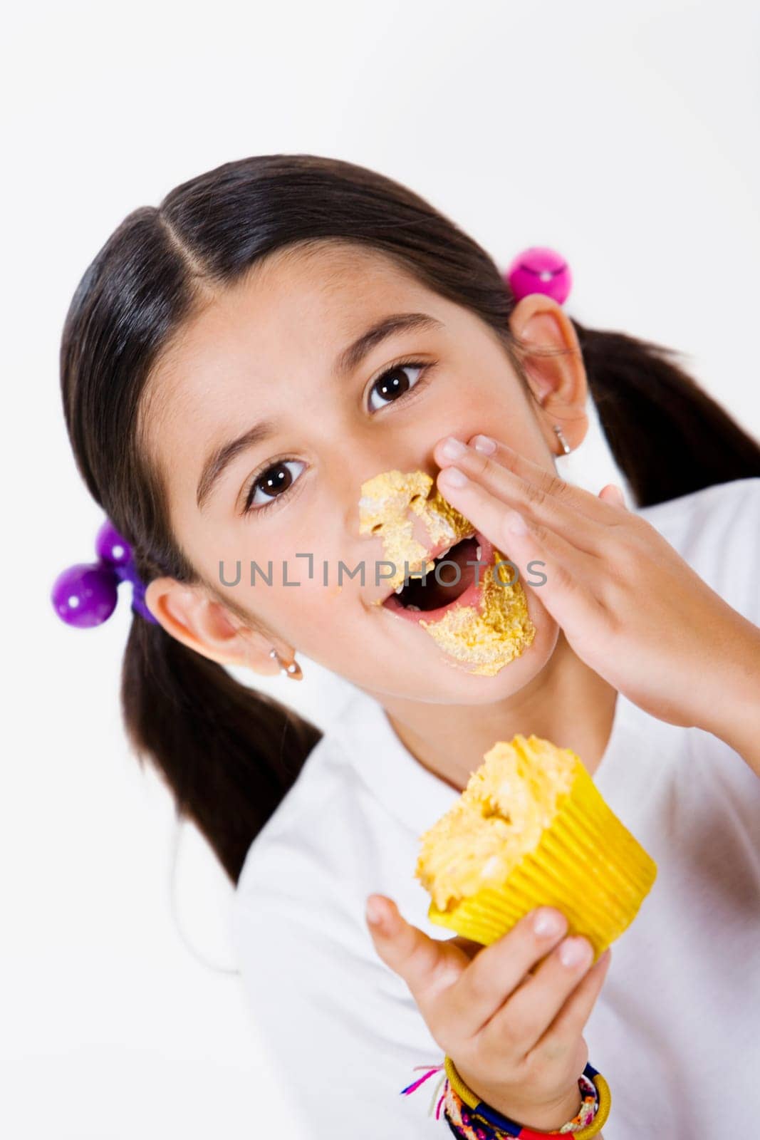 Portrait of a girl with cream on her face