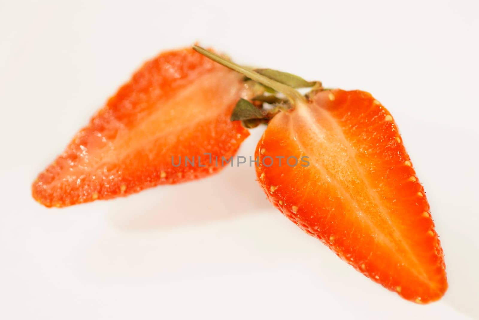 Close-up of a strawberry cut in half