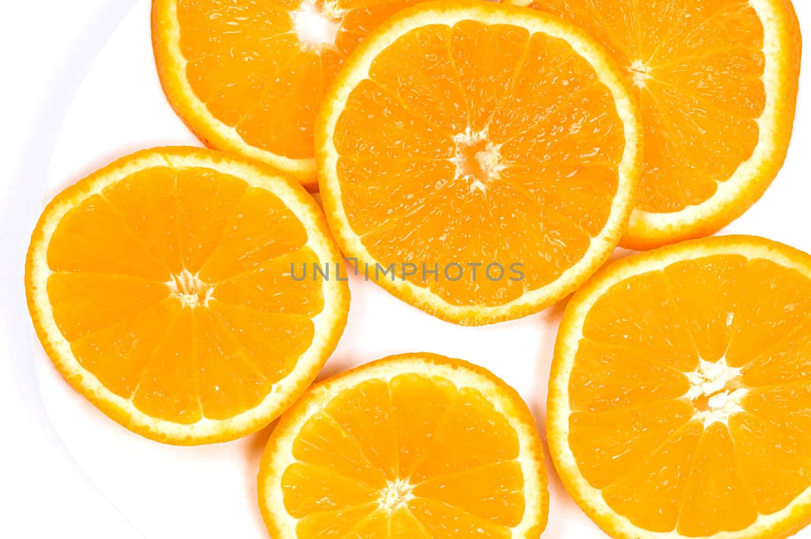 Close_up of slices of oranges in a plate