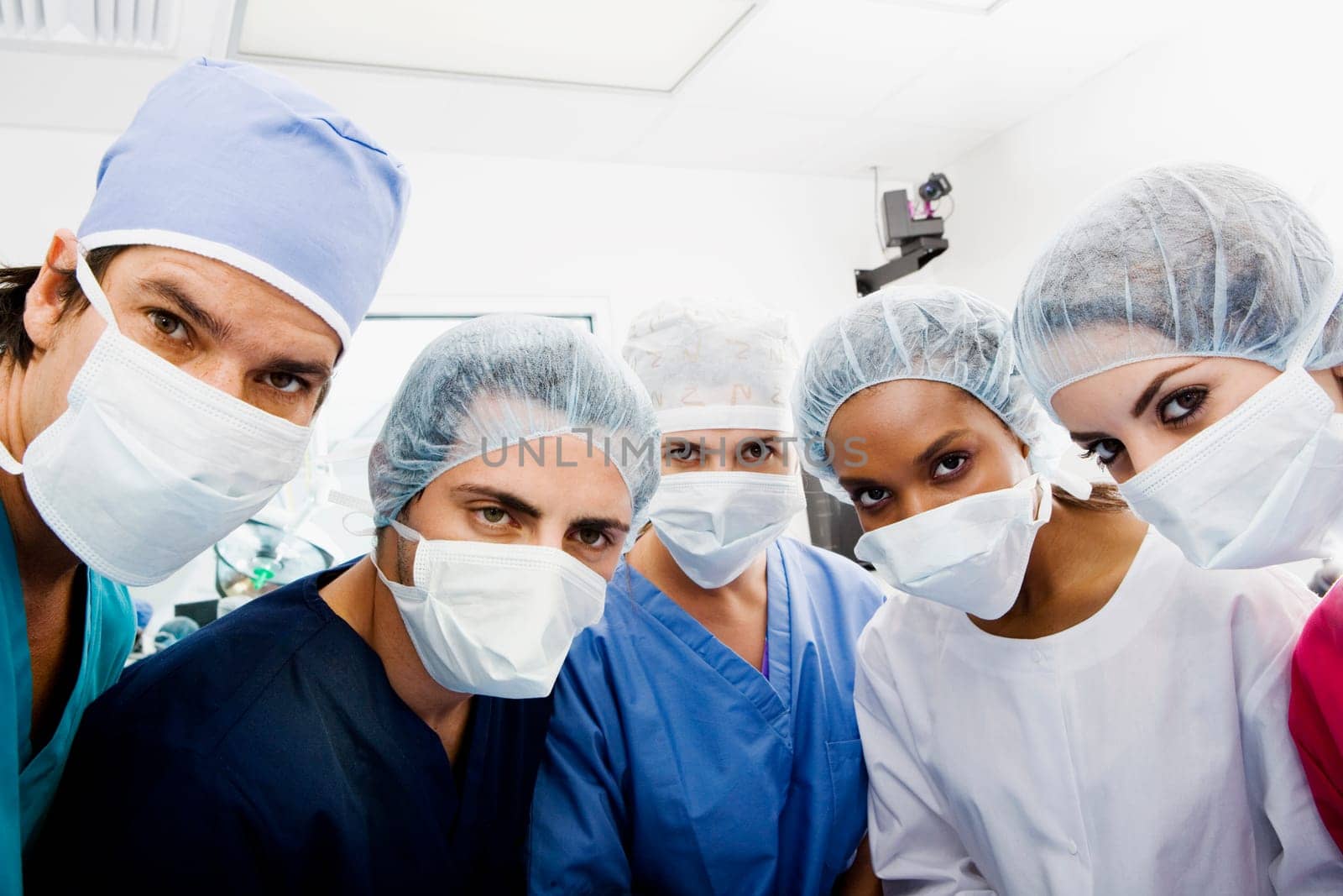 Portrait of surgeons standing in an operating room