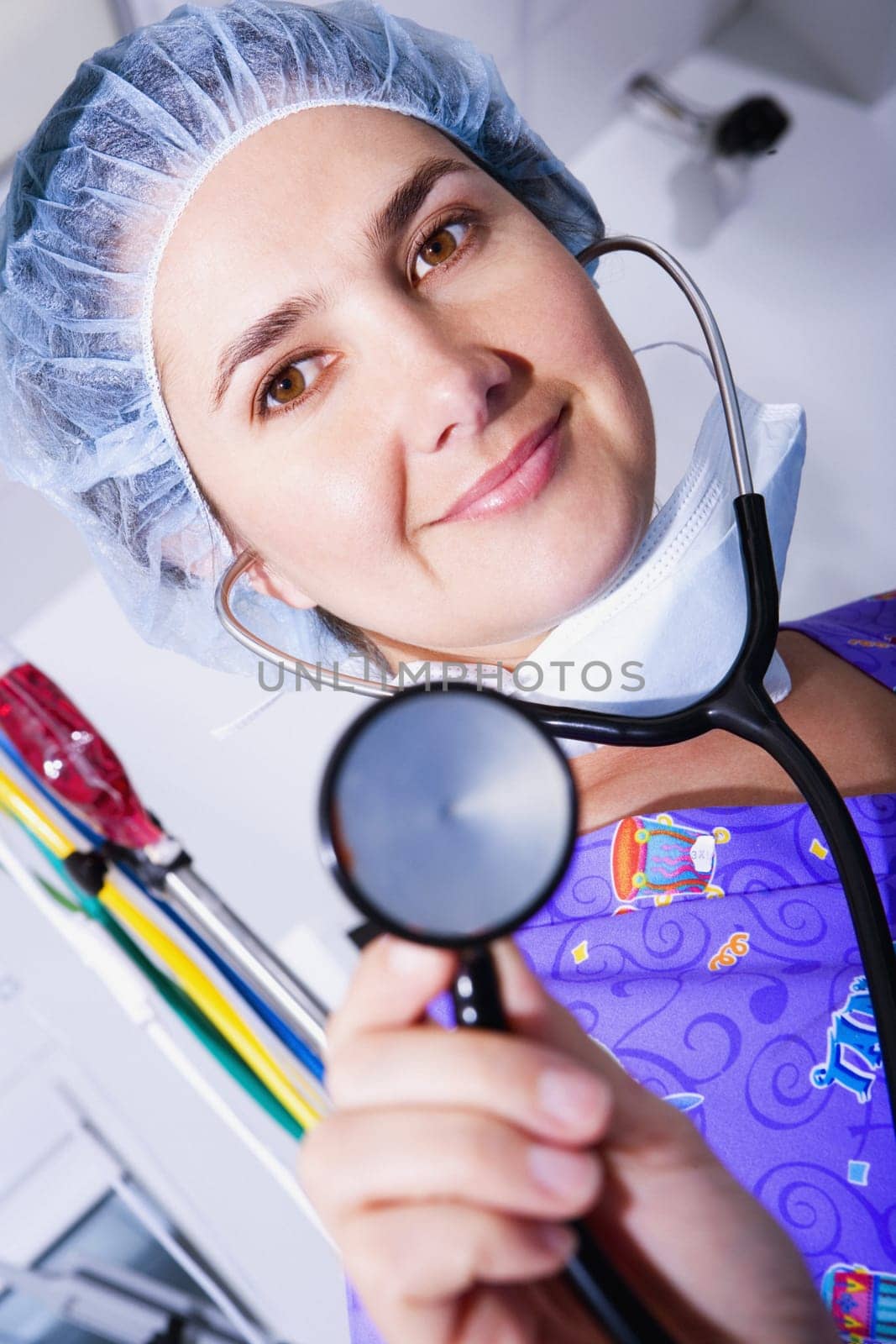 Portrait of a female doctor holding a stethoscope