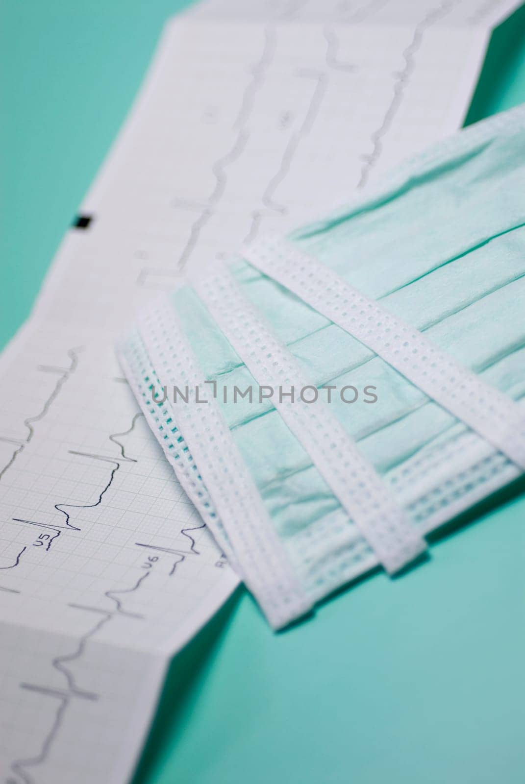 Close_up of an electrocardiogram report with a bandage