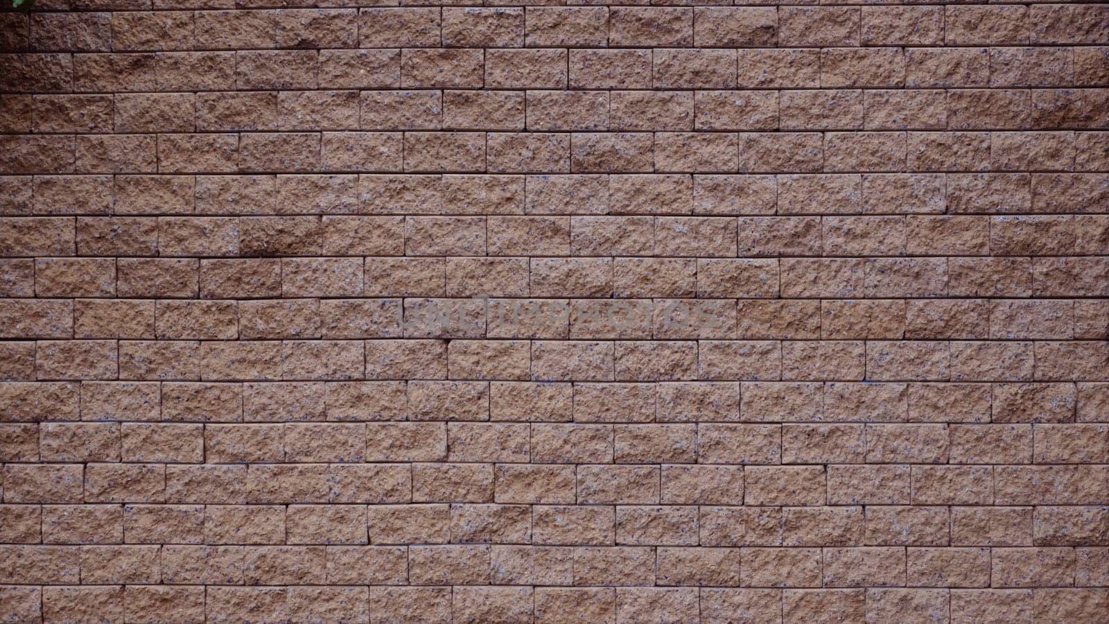 brick wall texture background. Brickwork or stonework flooring interior rock old pattern clean concrete grid uneven bricks design stack