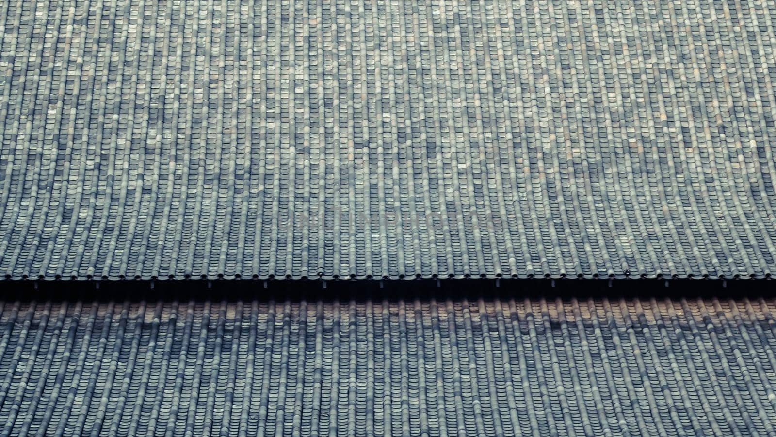 The Chinese Roof Tiles with Curve Design. The clay roof of a Japanese temple. material of traditional Asian architecture pattern texture background