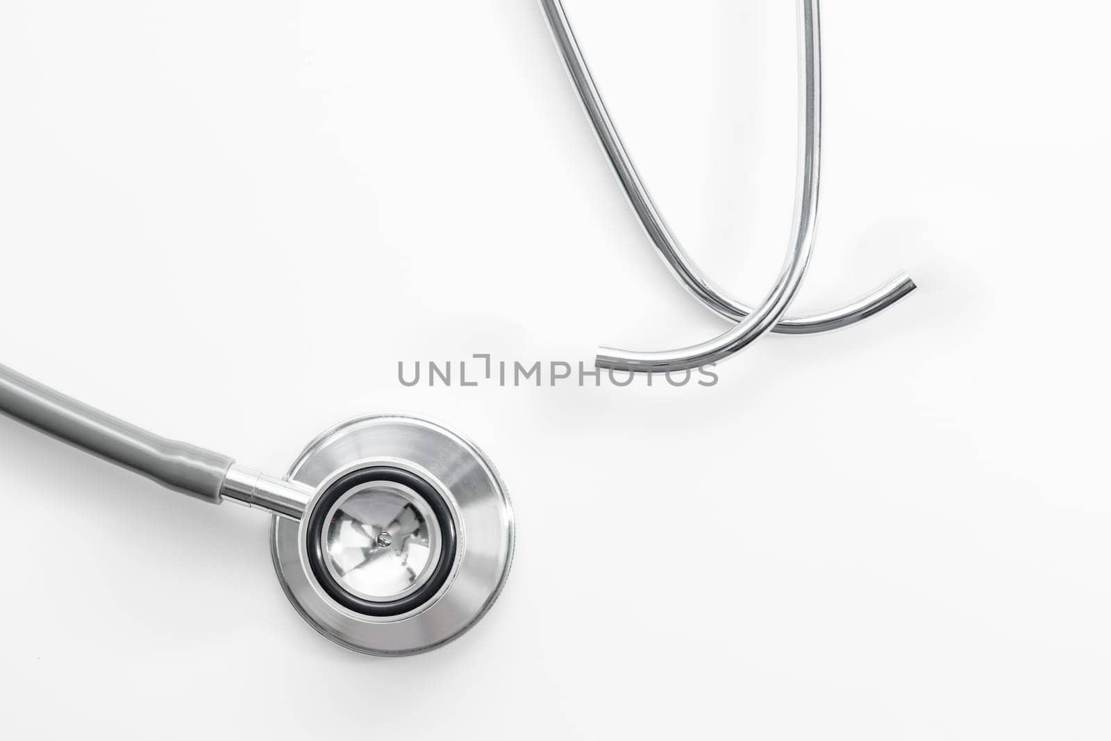 Stethoscope for doctor checkup in health medical laboratory table as medical concept