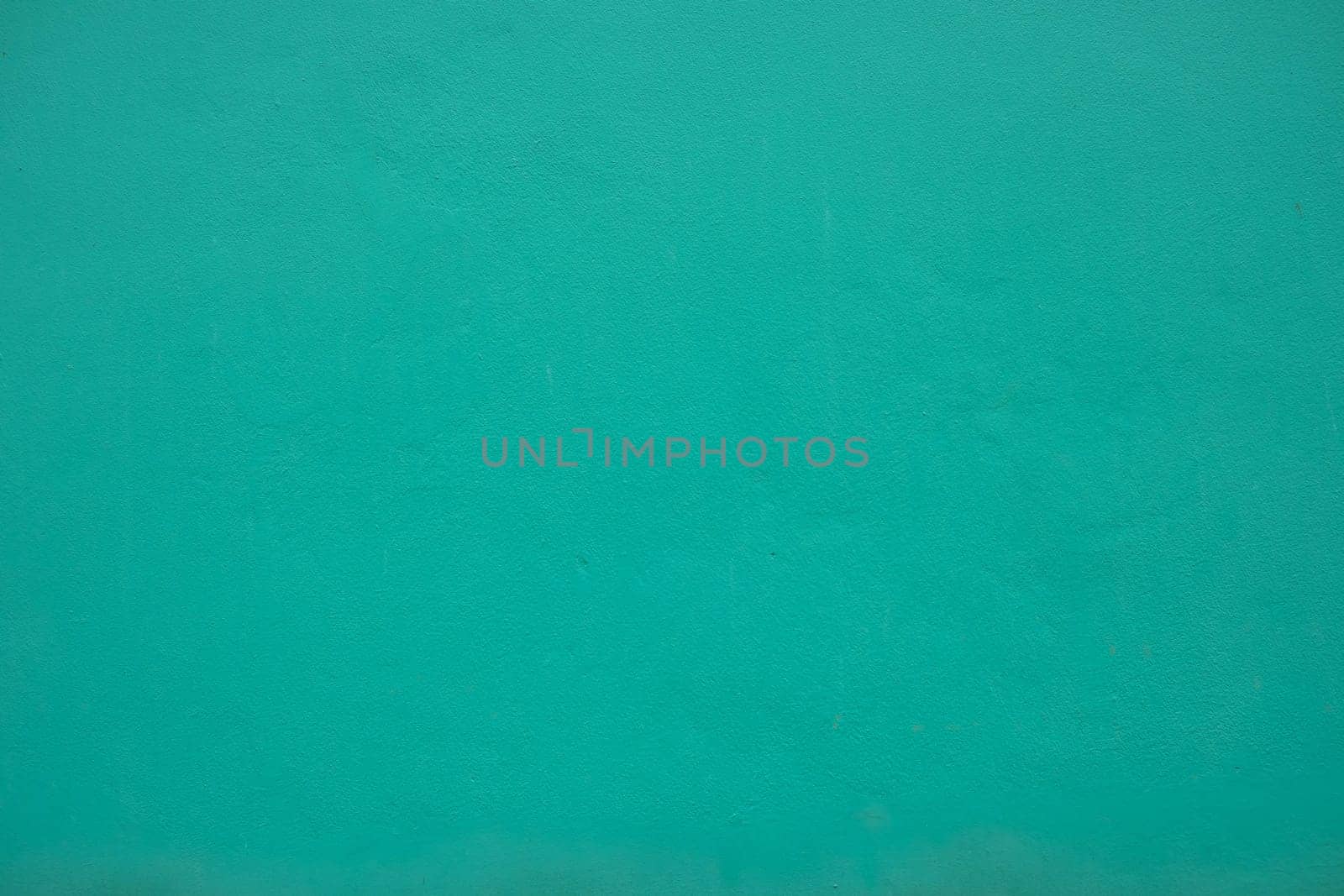Texture of blue turquoise paint wall background. Material in architecture and interior design.