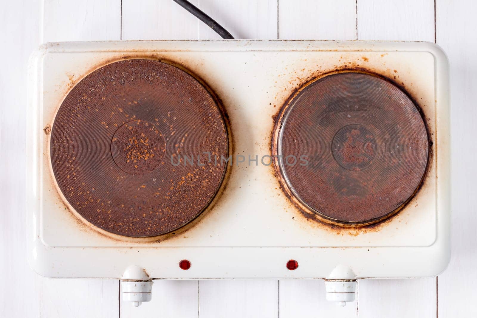 Top view of old rusty electric cooker