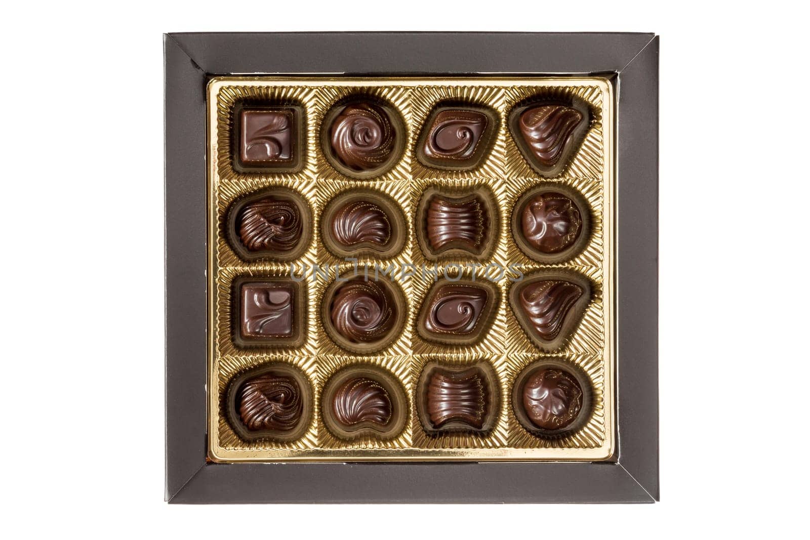 Dark chocolate pralines in a square box isolated on white background