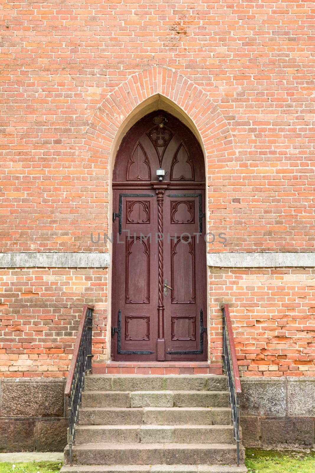 Church front entrance with old wooden doors