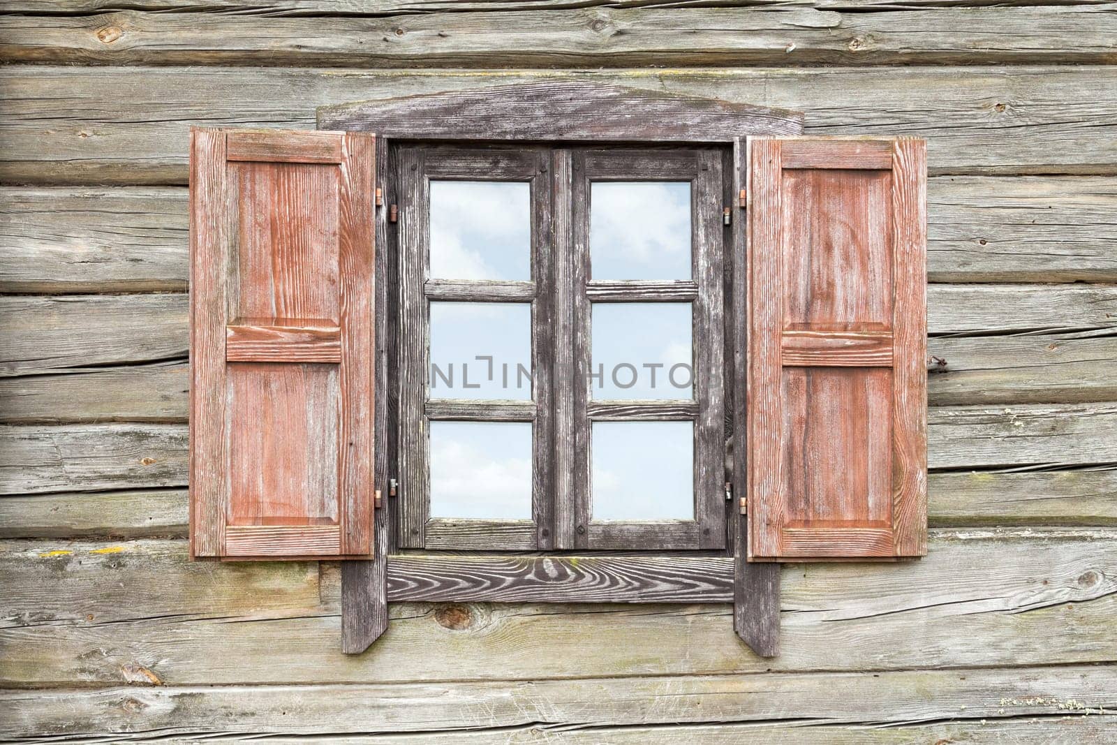 The window of the old wooden log house
