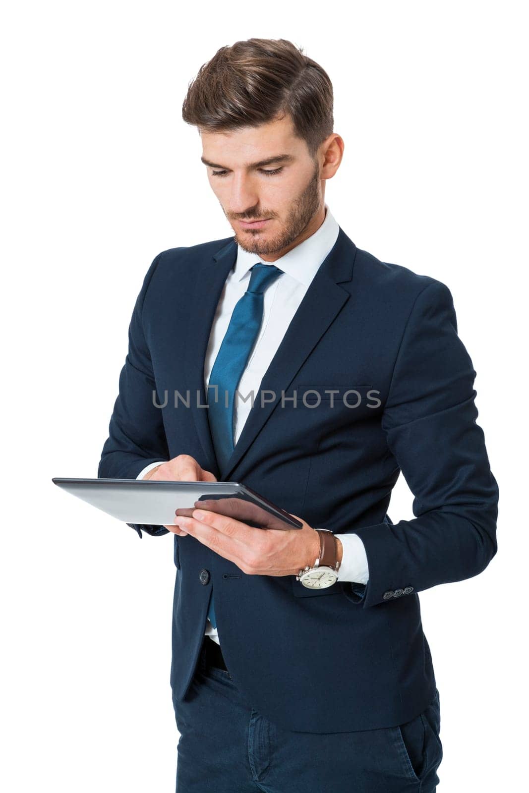 Businessman with a tablet computer touchscreen with his finger while surfing close-up from hands and tablet isolated on white background