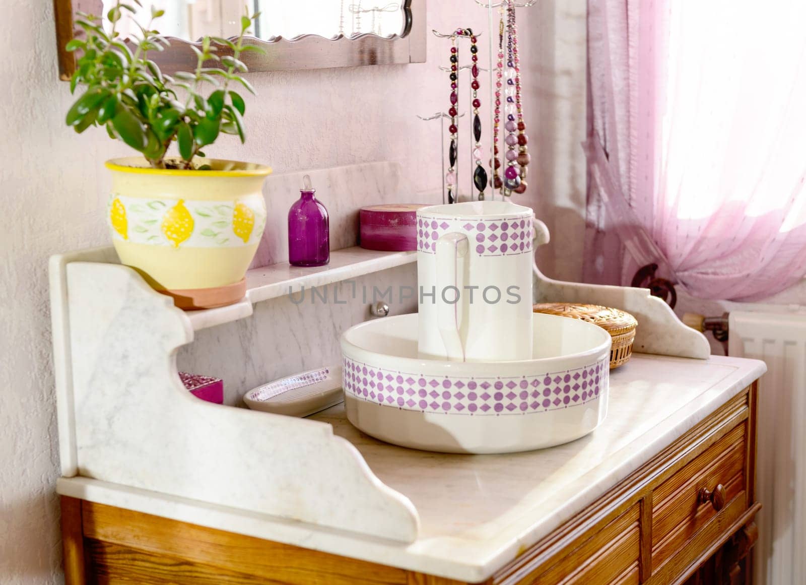 pitcher and lavatory bowl in a rustic bedroom