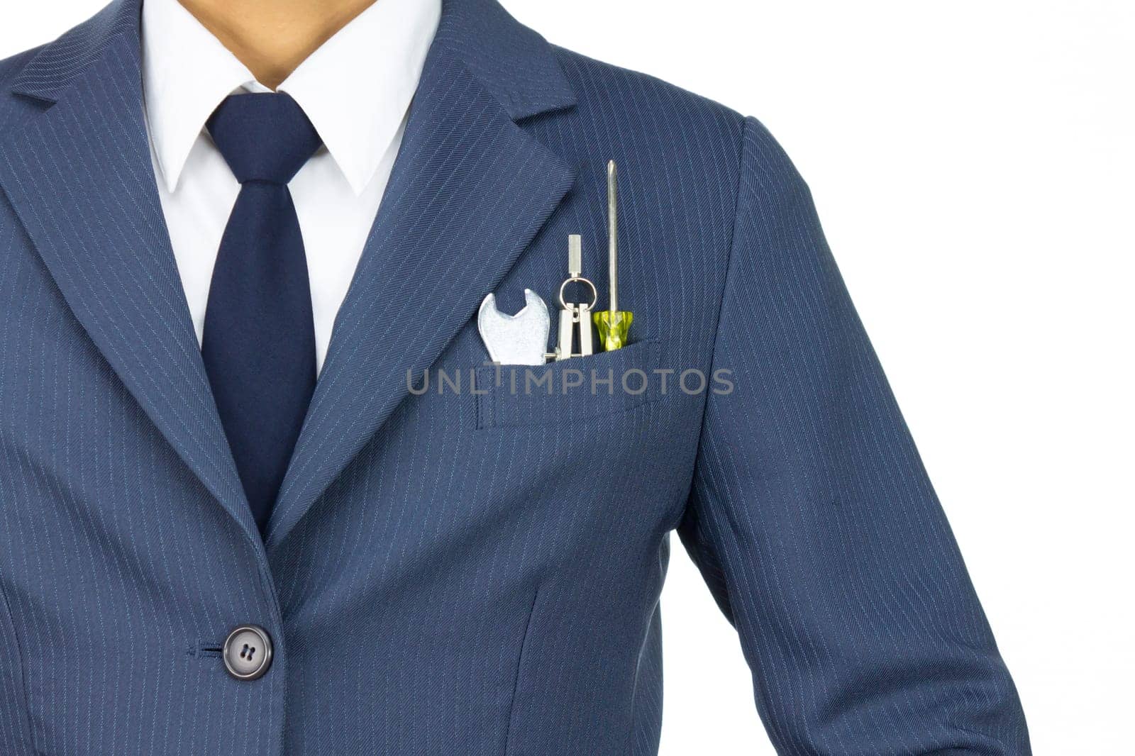Businessman in Blue Suit with Wrench and Dividers and Screwdriver in Pocket Isolated on White Background. Concept about Technique or Mechanic or Repairing or Maintenance.