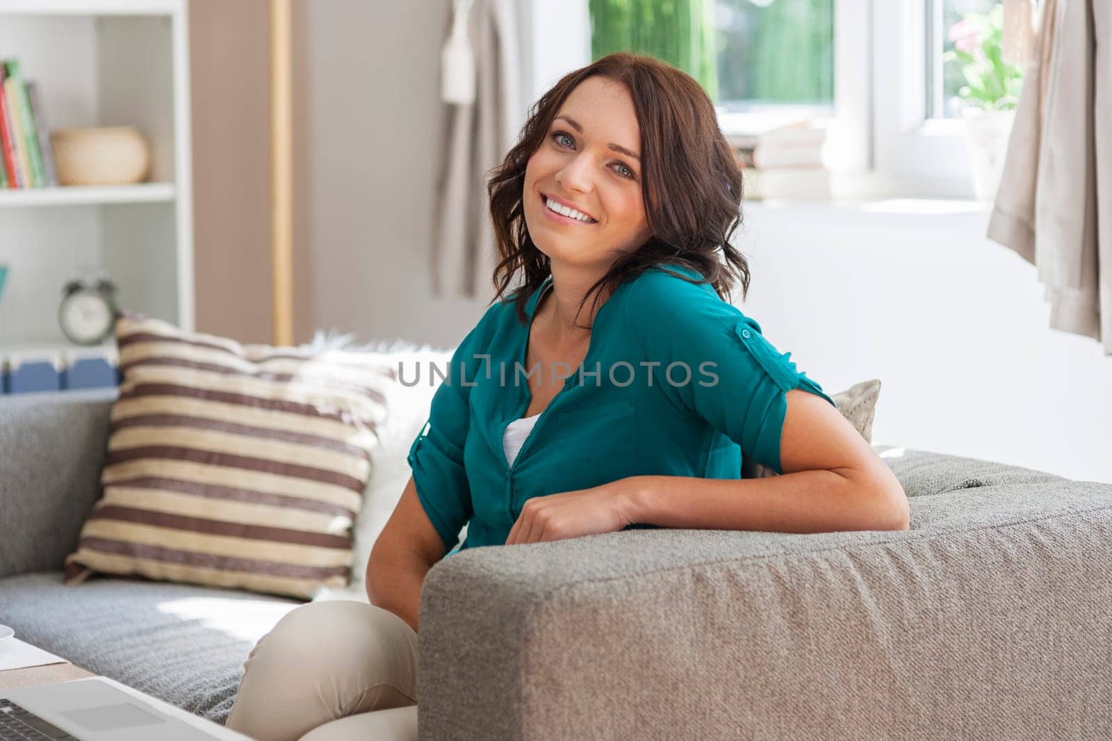 Shining face of beautiful woman at home