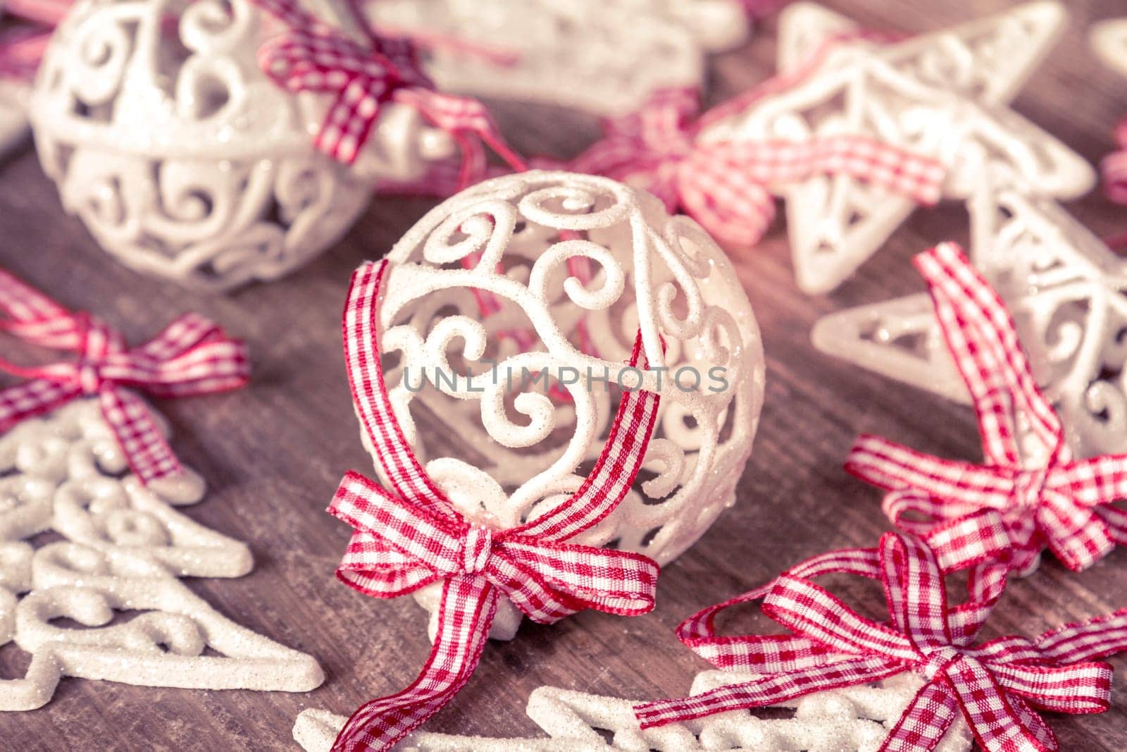 Christmas baubles and glittery xmas decorations with red ribbons