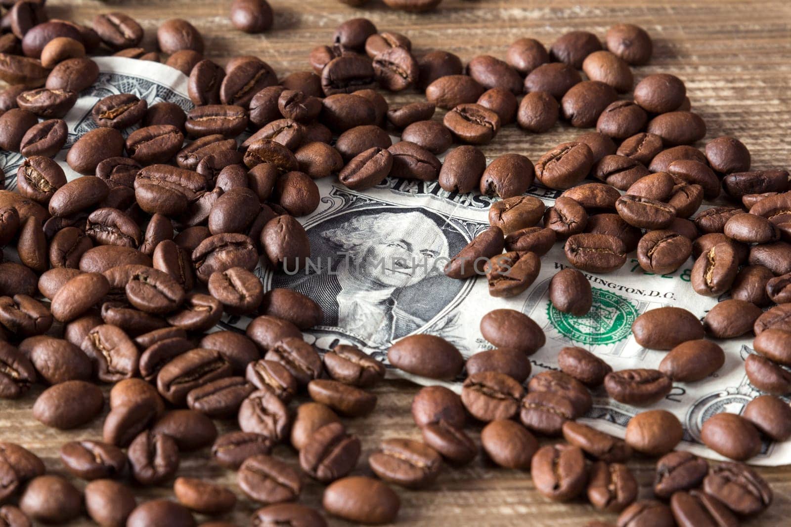 Coffee beans on dollar banknote,high or low price of coffee on stock market