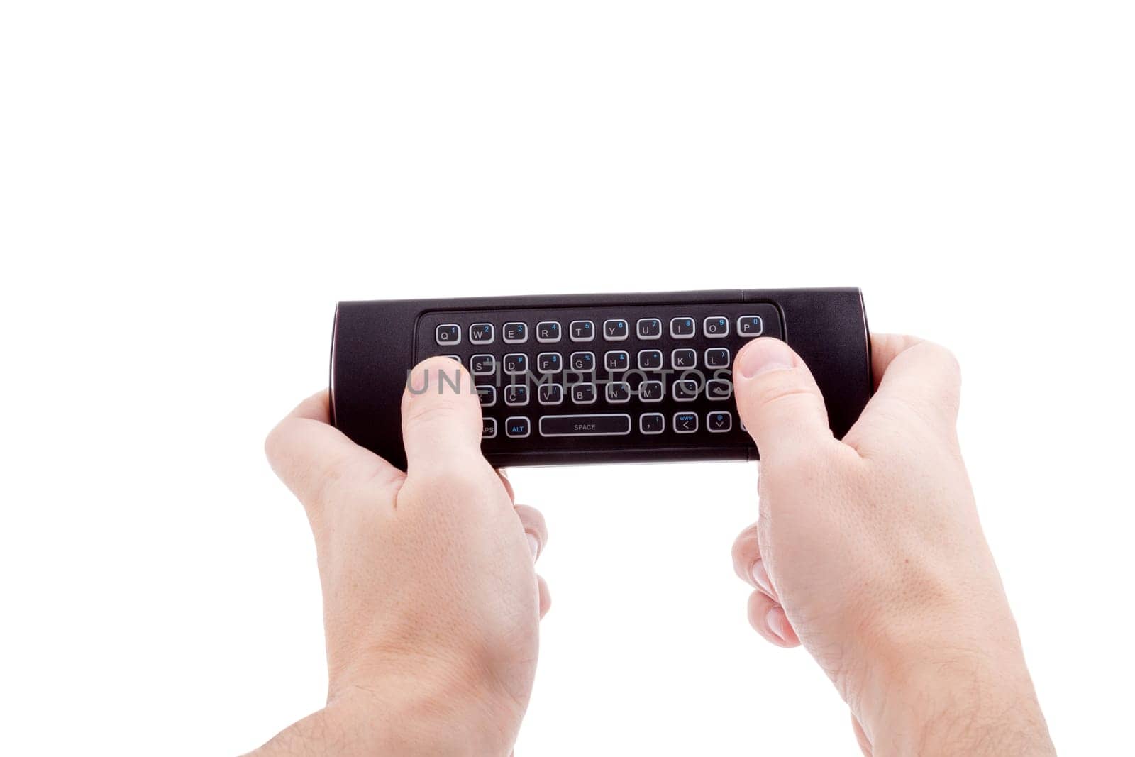 Hands holding smart tv remote control with keyboard. Isolated on white background.