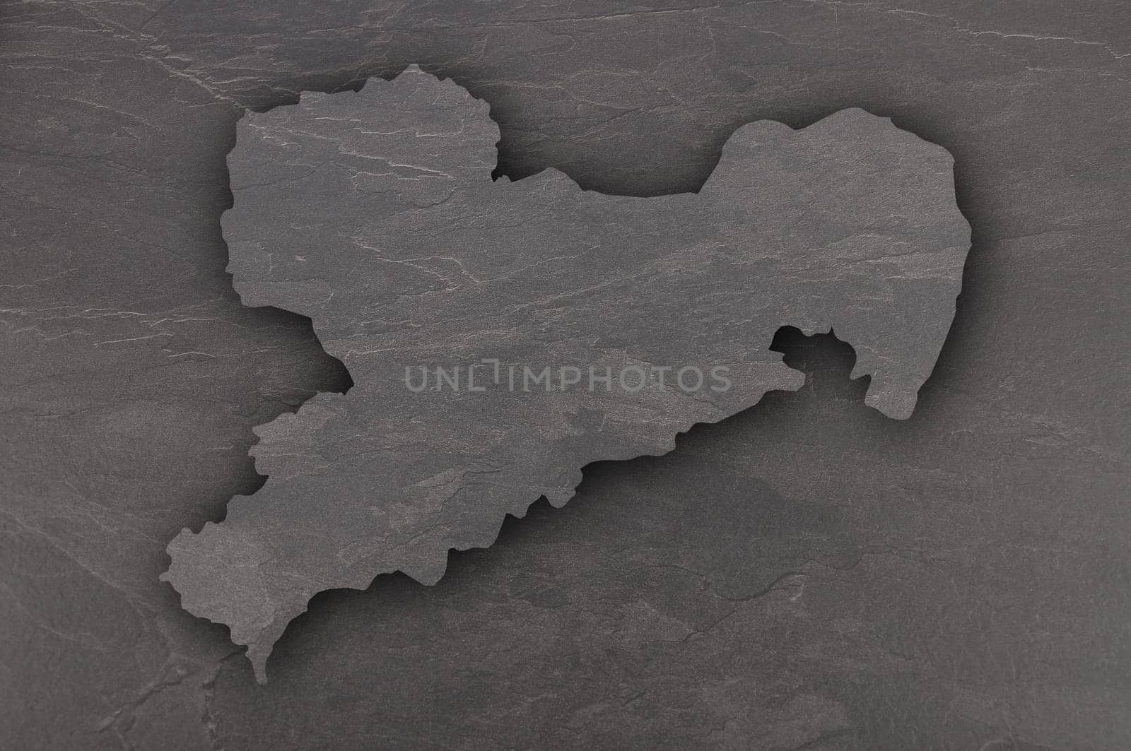 Map of Saxony on dark slate
