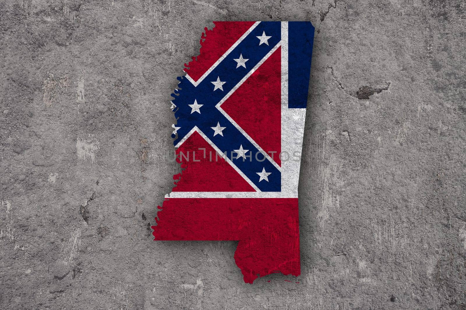 Map and flag of Mississippi on weathered concrete