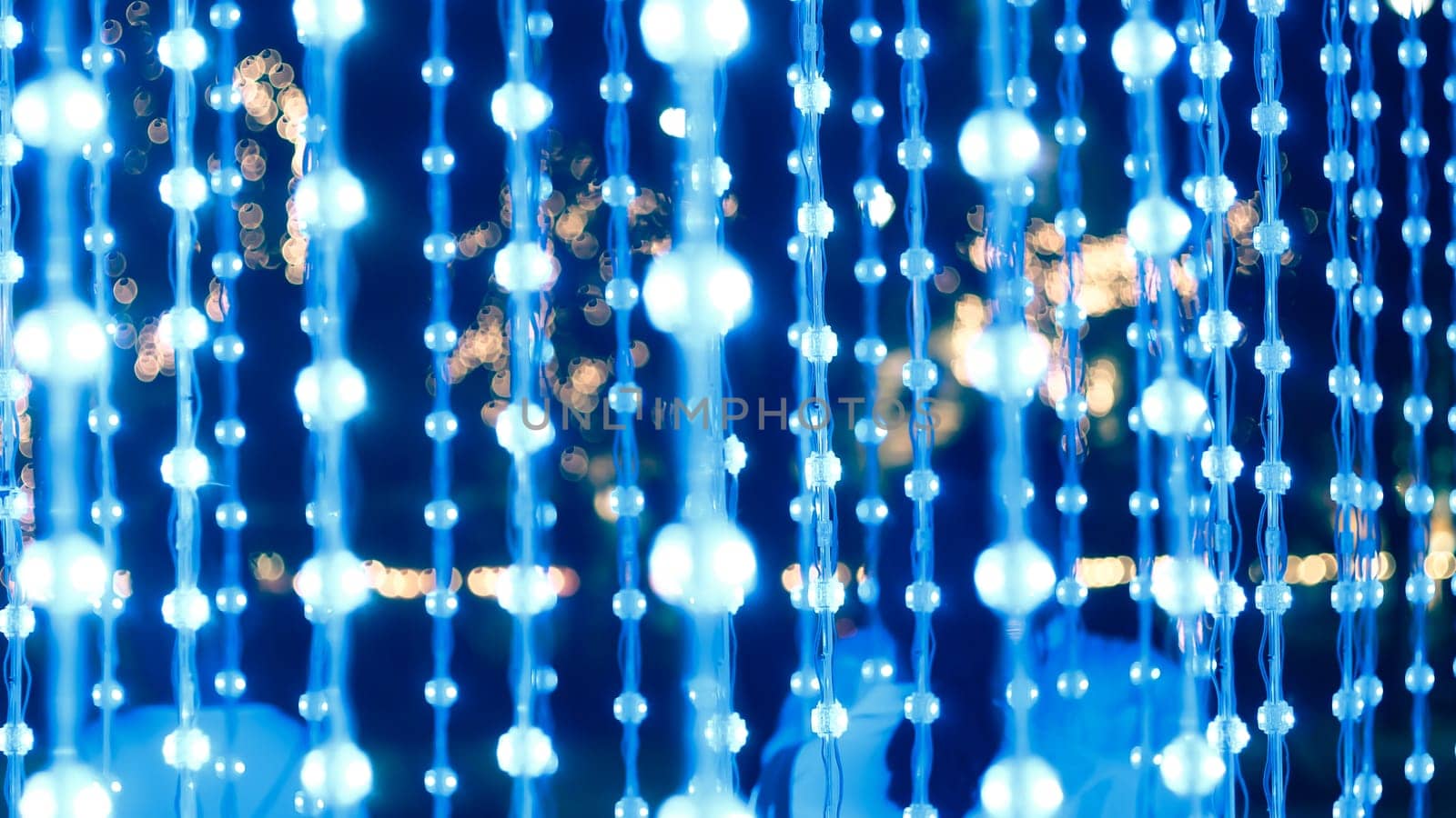 String lights, wood background lightbulbs bokeh merry Christmas street lighting in street party in town garden evening people happy night street bokeh festival on streetlight vibrant bulb party lights string night
