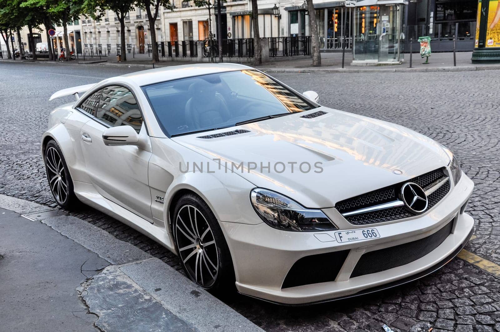 PARIS, FRANCE - CIRCA JULY 2009: A white Mercedes SL 65 AMG Black Series parked on Avenue George V.