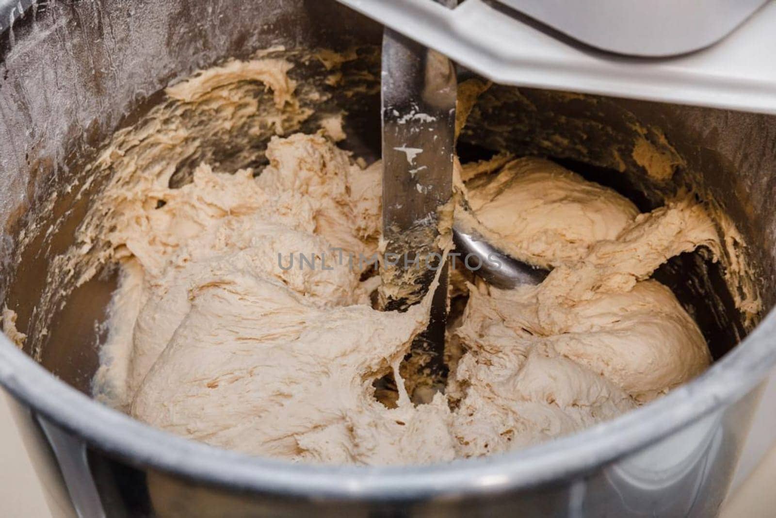 Testomes dough mixer with dough. cooking the dough in the dough.