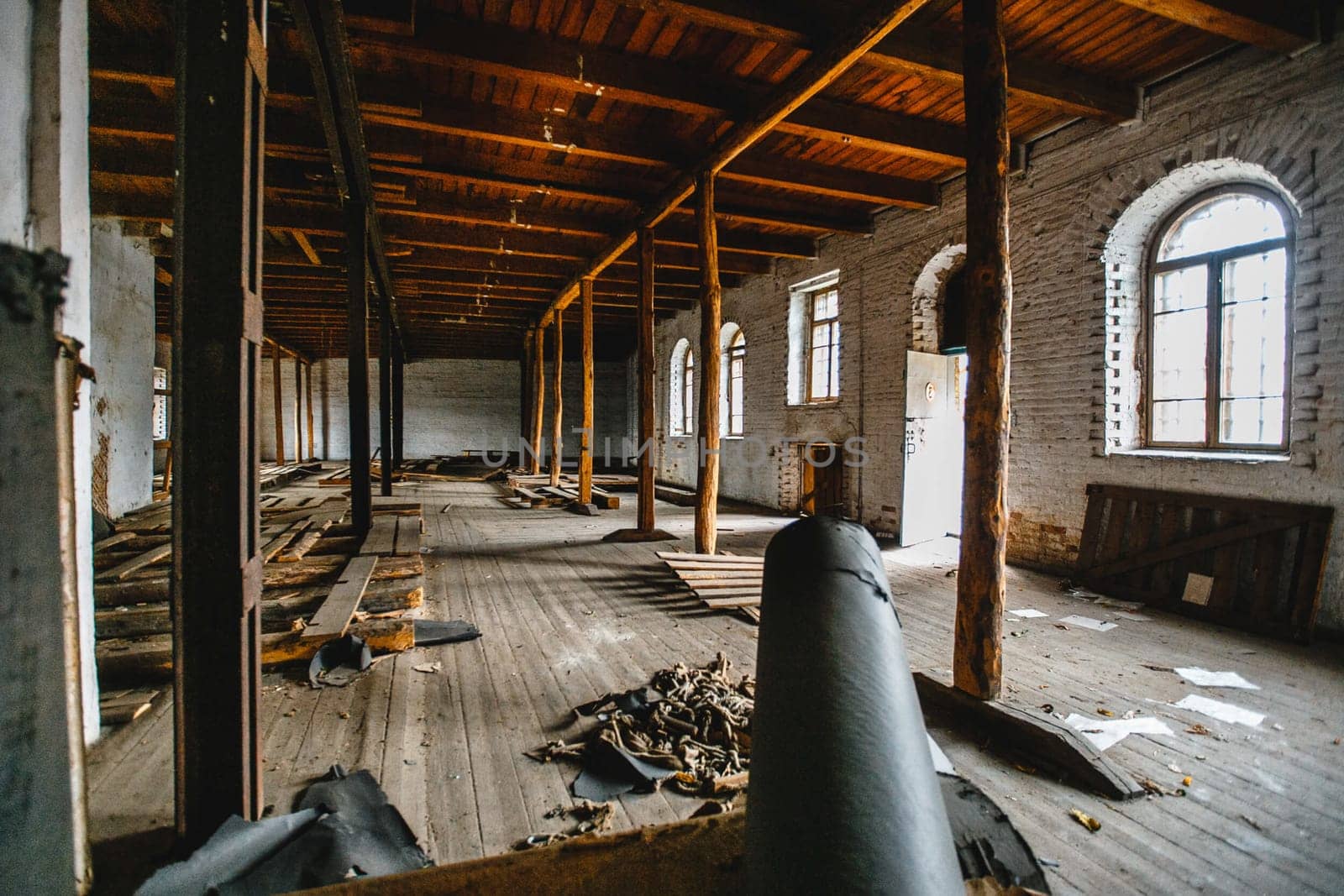 Wooden beams inside an old abandoned building.