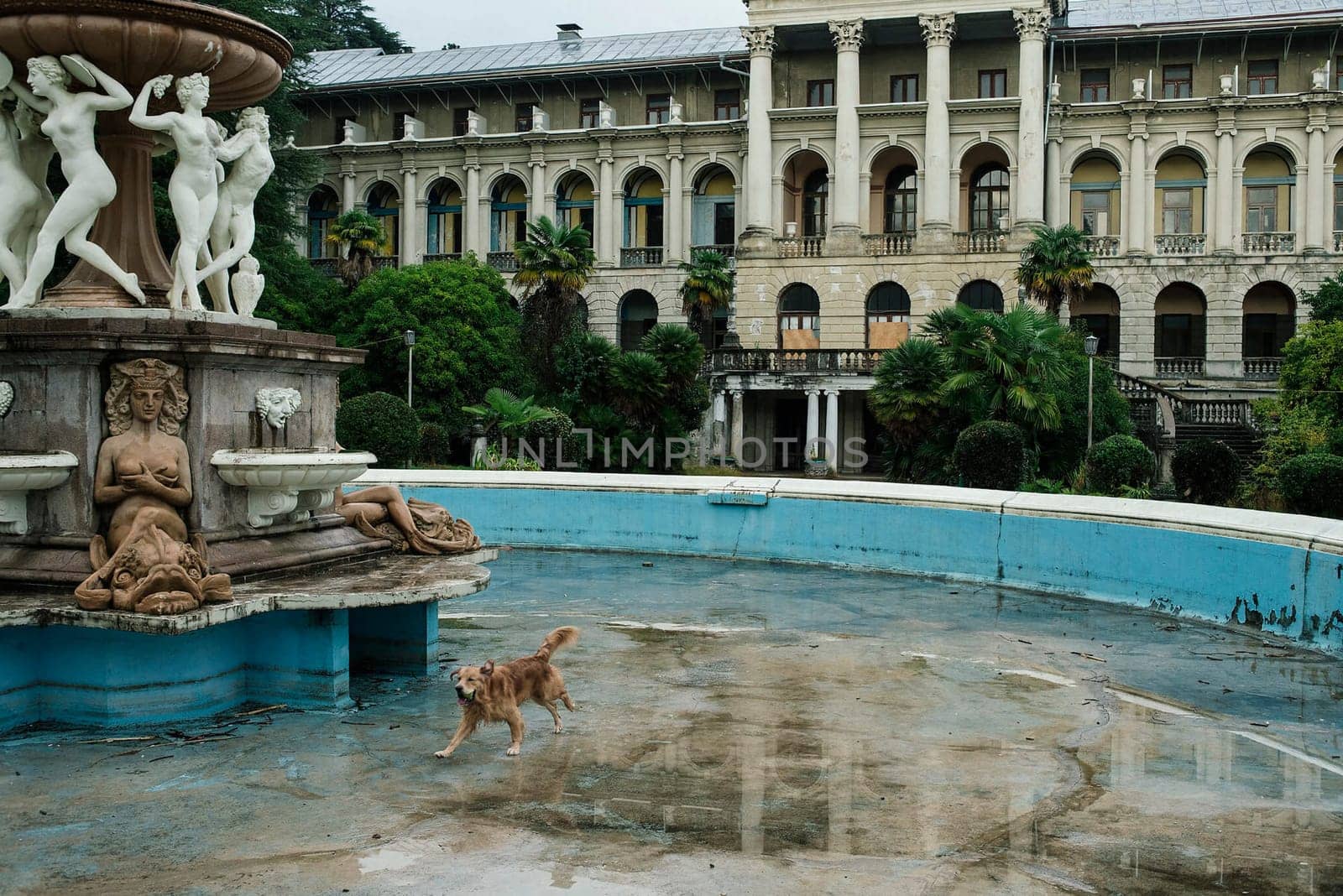 Fountain with statues near the ancient ancient palace. The manor of the master.
