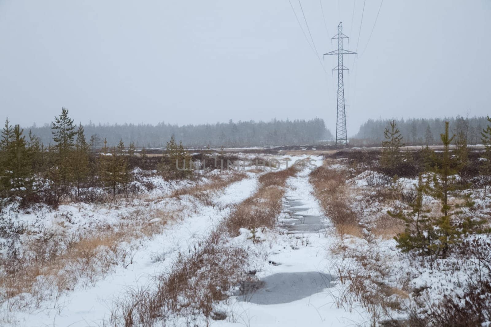 Power line supports. Electricity transmission and posts.