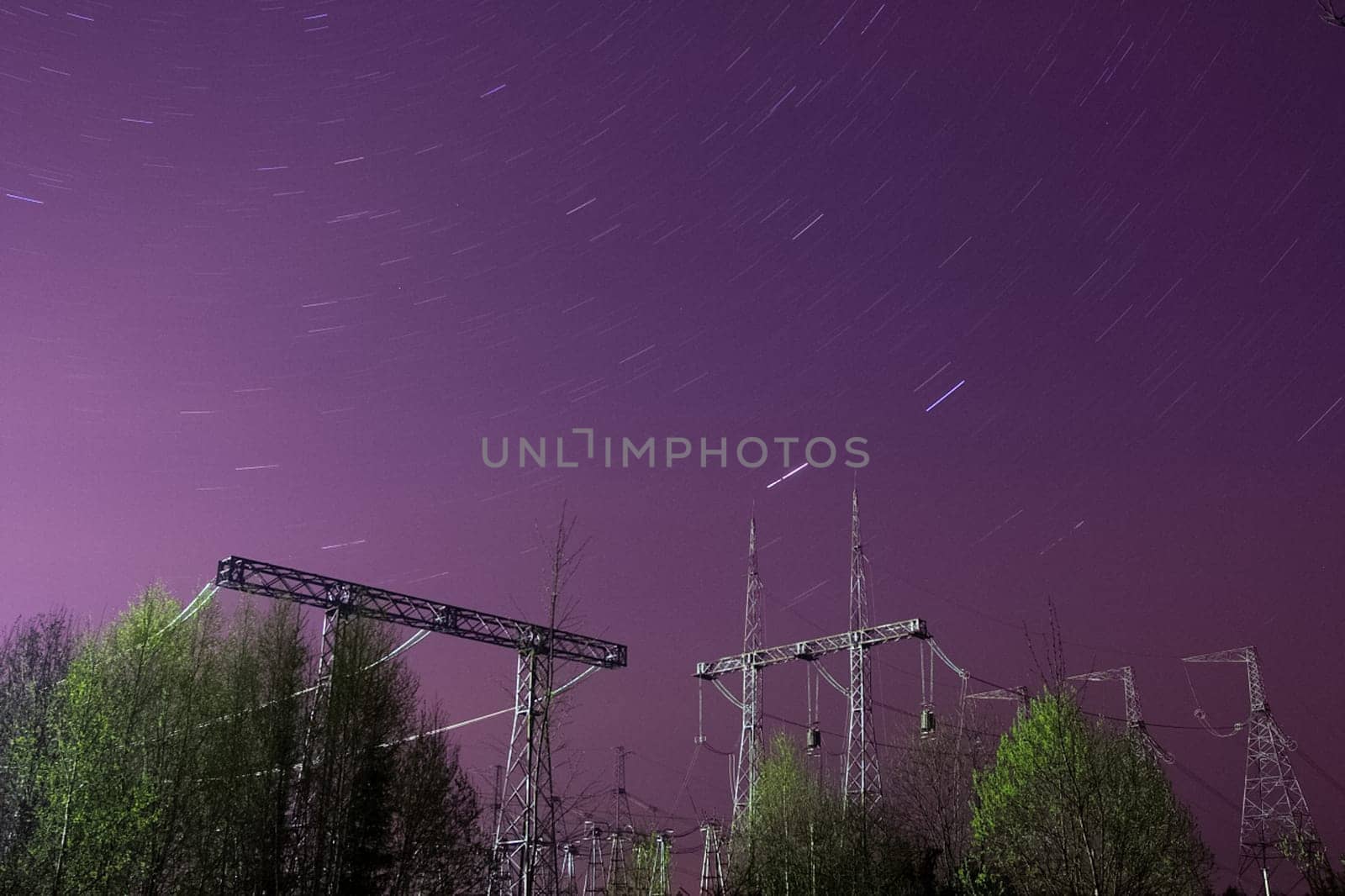 Power line supports. Electricity transmission and posts.