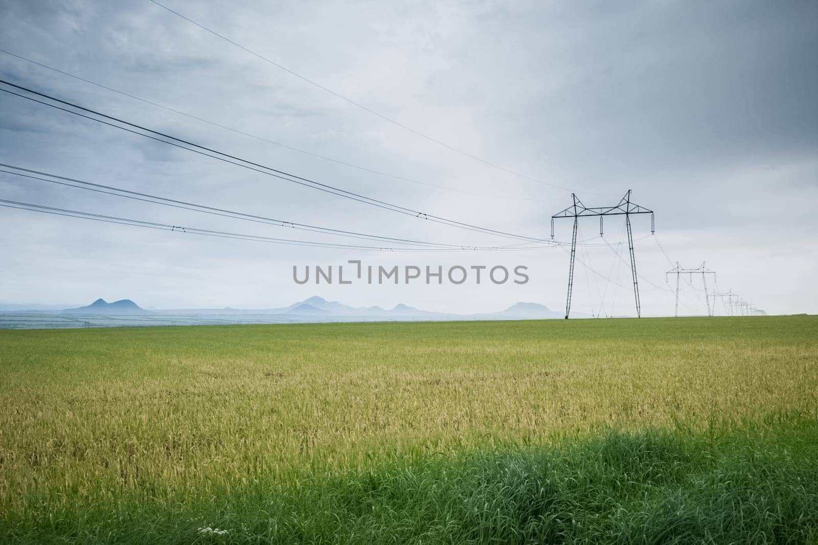 Power line supports. Electricity transmission and posts.