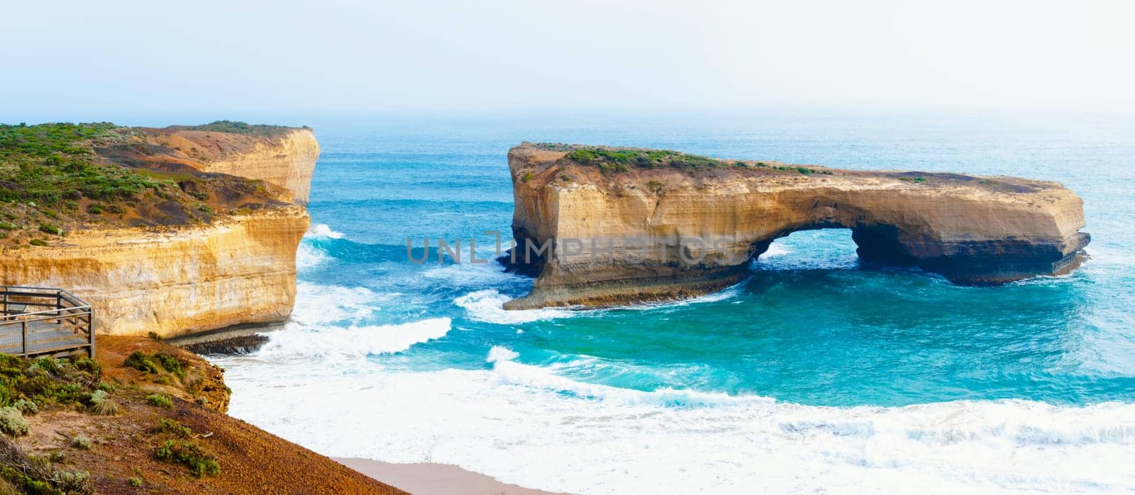 London Bridge at The Twelve Apostles, a famous collection of limestone stacks off the shore of the Port Campbell National Park, by the Great Ocean Road in Victoria, Australia