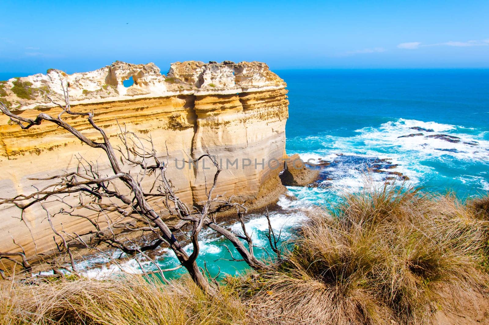 The Twelve Apostles, a famous collection of limestone stacks off the shore of the Port Campbell National Park, by the Great Ocean Road in Victoria, Australia