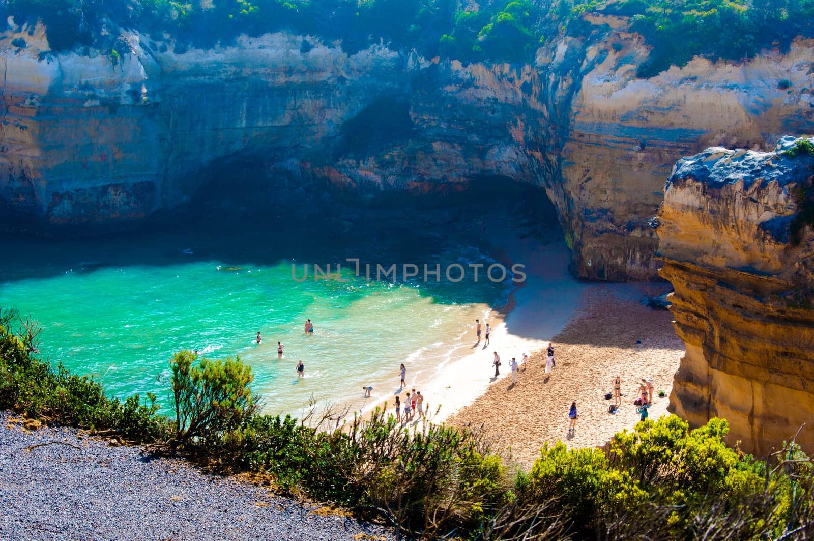 Port Campbell National Park, Victoria state, Australia - February 19, 2015: Tourists visiting the Twelve Apostles, a famous collection of limestone stacks off the shore of the Port Campbell National Park, by the Great Ocean Road in Victoria, Australia