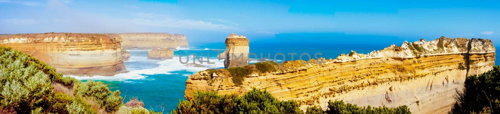 The Twelve Apostles, a famous collection of limestone stacks off the shore of the Port Campbell National Park, by the Great Ocean Road in Victoria, Australia