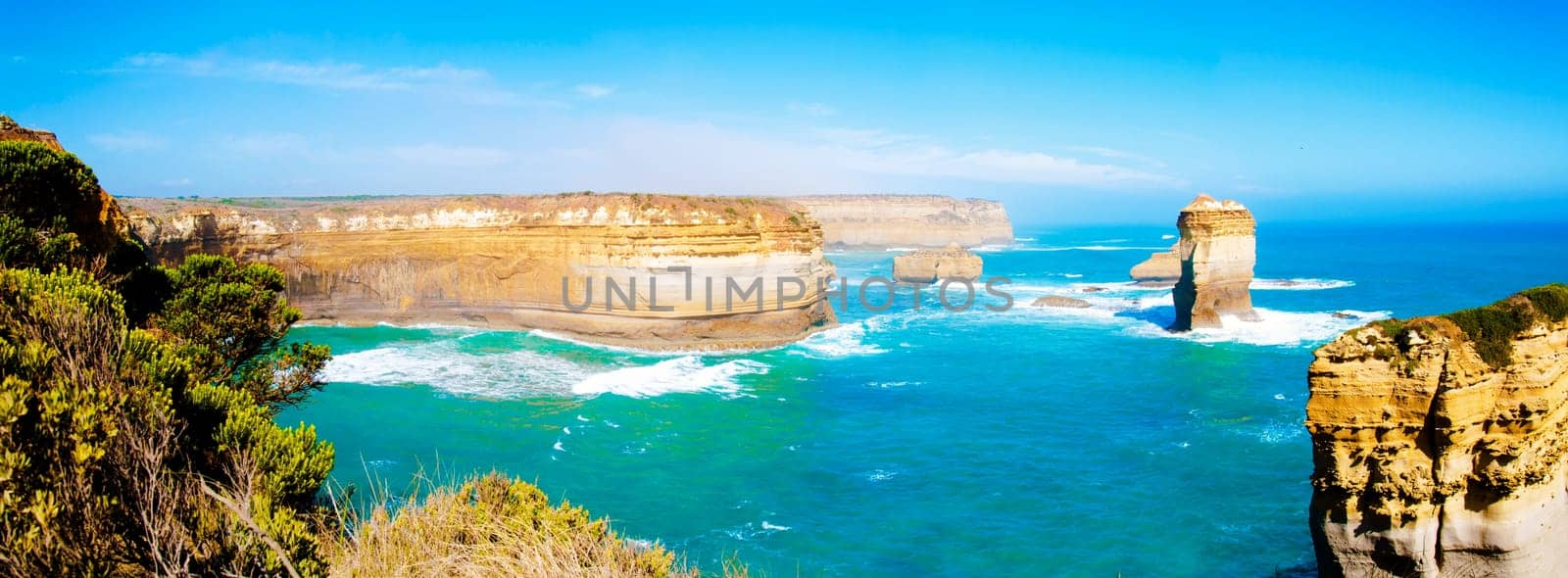 The Twelve Apostles, a famous collection of limestone stacks off the shore of the Port Campbell National Park, by the Great Ocean Road in Victoria, Australia