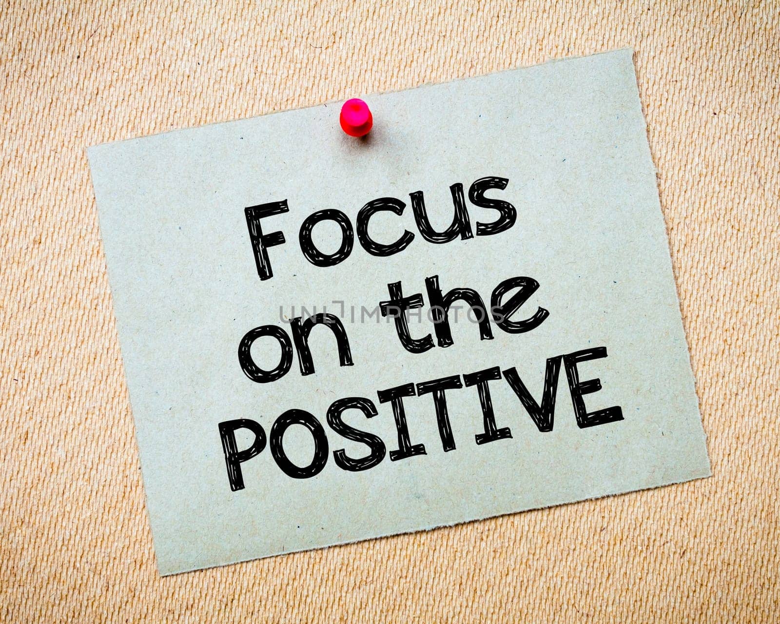 Recycled paper note pinned on cork board.Enjoy Life Message.Happiness Concept Image