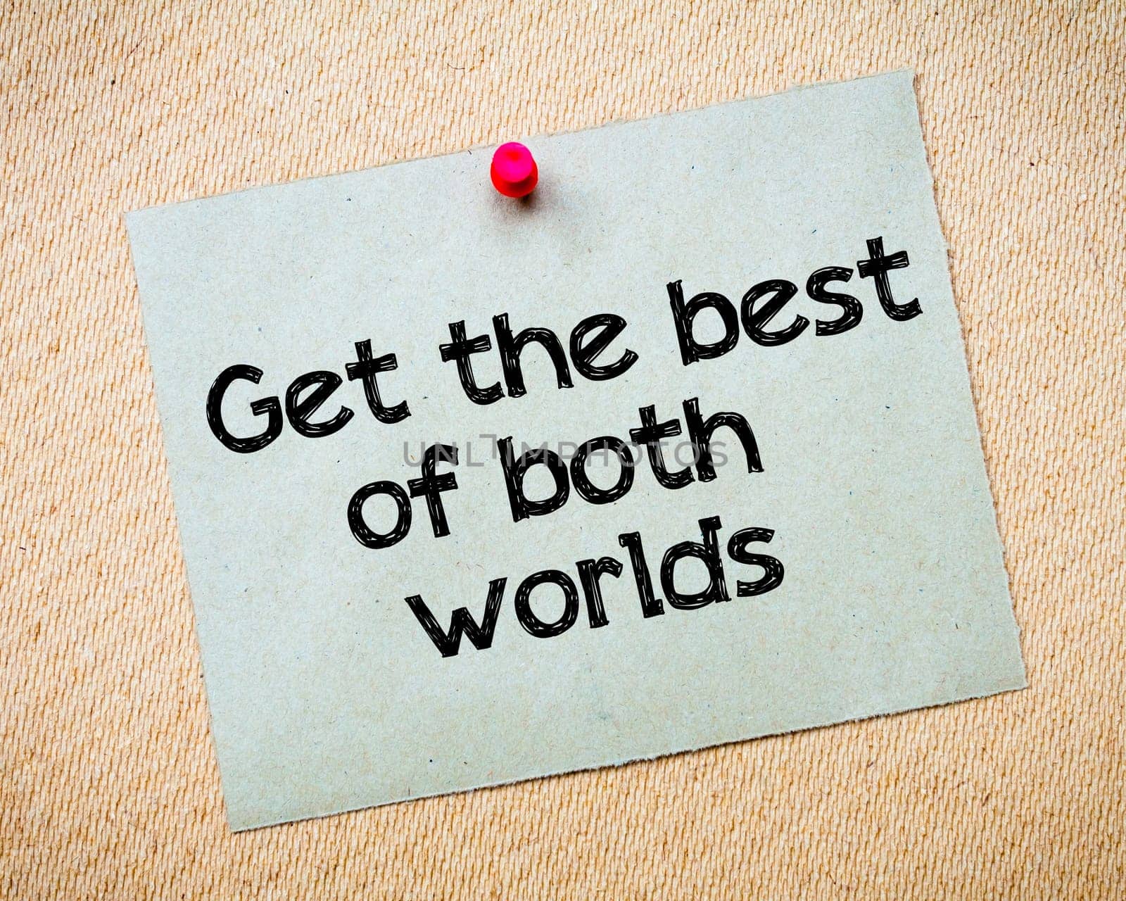 Be careful what you wish for Message. Recycled paper note pinned on cork board. Concept Image