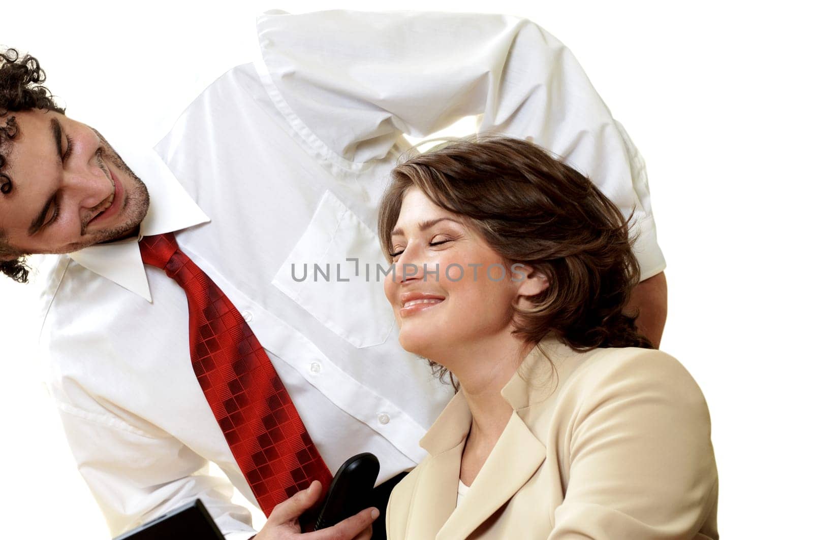 Close-up of a businessman and a businesswoman smiling