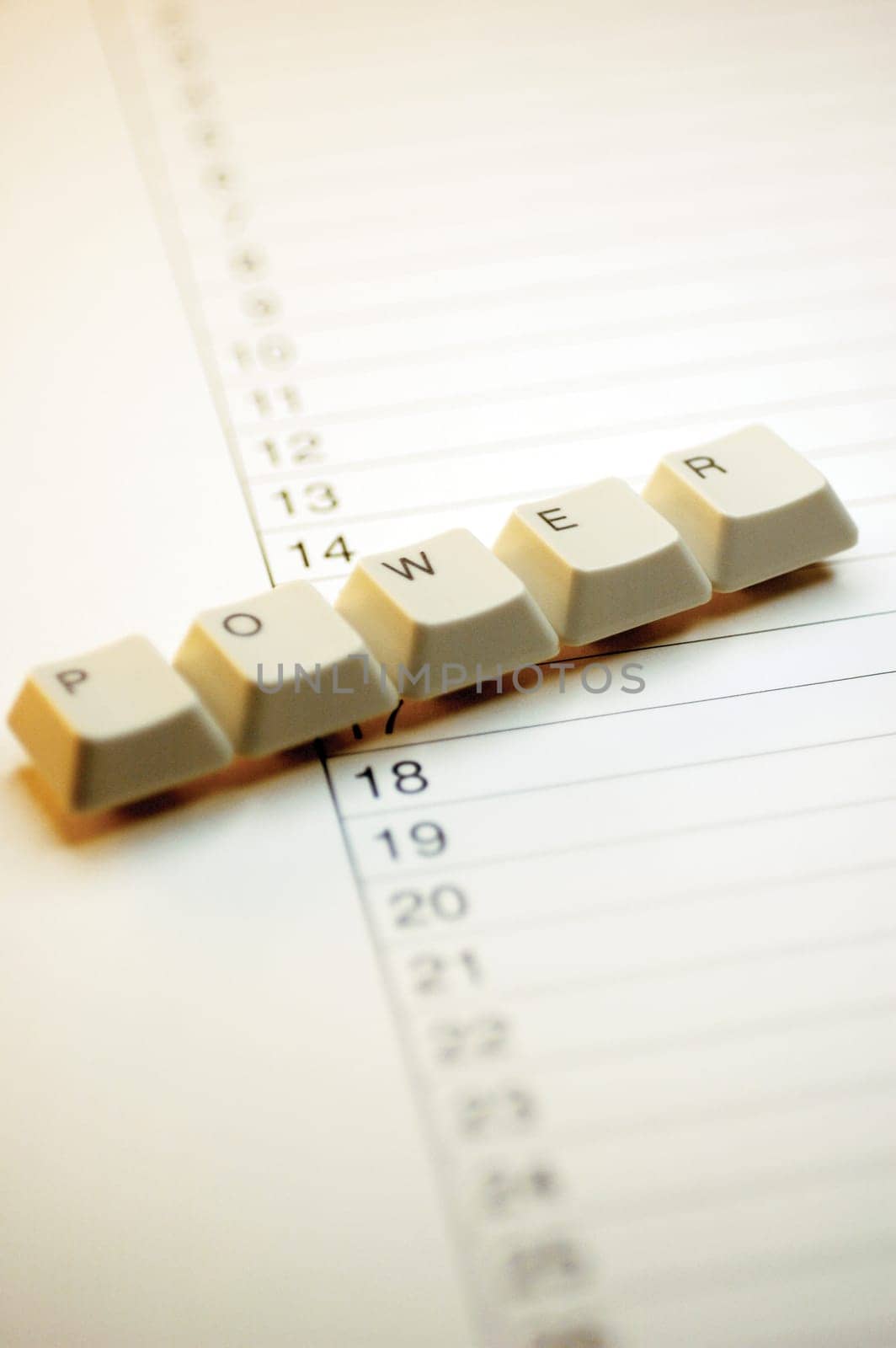 Close-up of computer keys on a paper